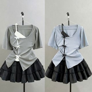 Set bộ Bigsize Nữ áo thun kiểu tay ngắn cách điệu 2 lớp viền gắn nơ phối chân váy chữ A bèo có quần bảo hộ - SET978