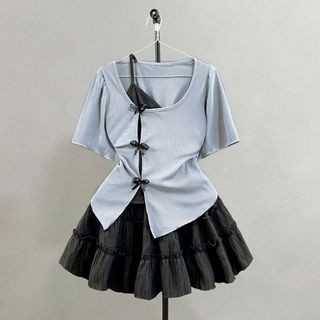 Set bộ Bigsize Nữ áo thun kiểu tay ngắn cách điệu 2 lớp viền gắn nơ phối chân váy chữ A bèo có quần bảo hộ - SET978