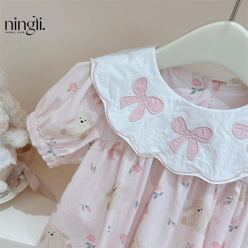 (Order) Váy cổ bèo thêu nơ dáng babydoll hoạ tiết gấu nơ dành cho bé gái