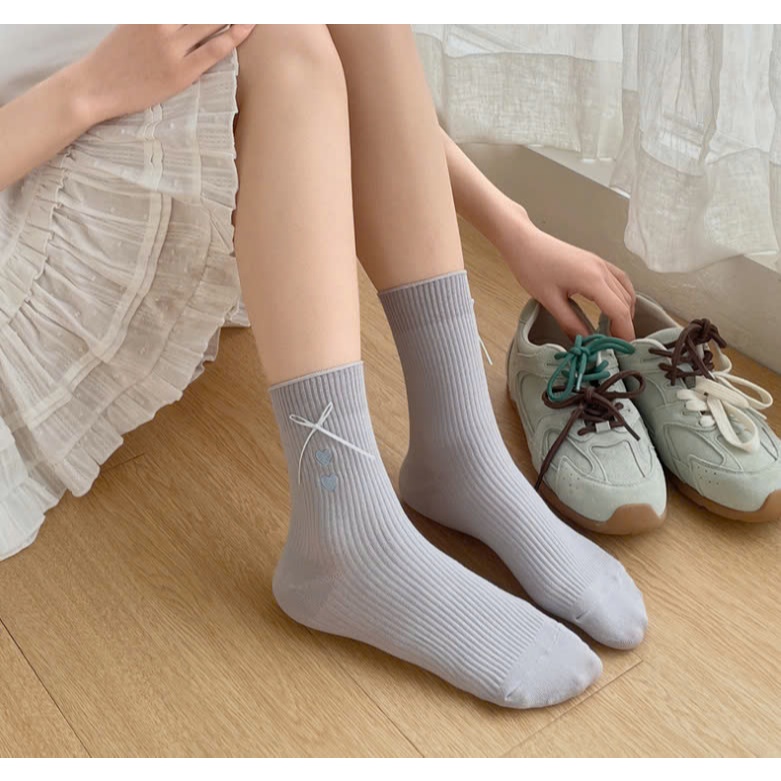 Vớ Tất nữ họa tiết trái tim, nơ cổ cao phong cách trẻ trung, năng động.