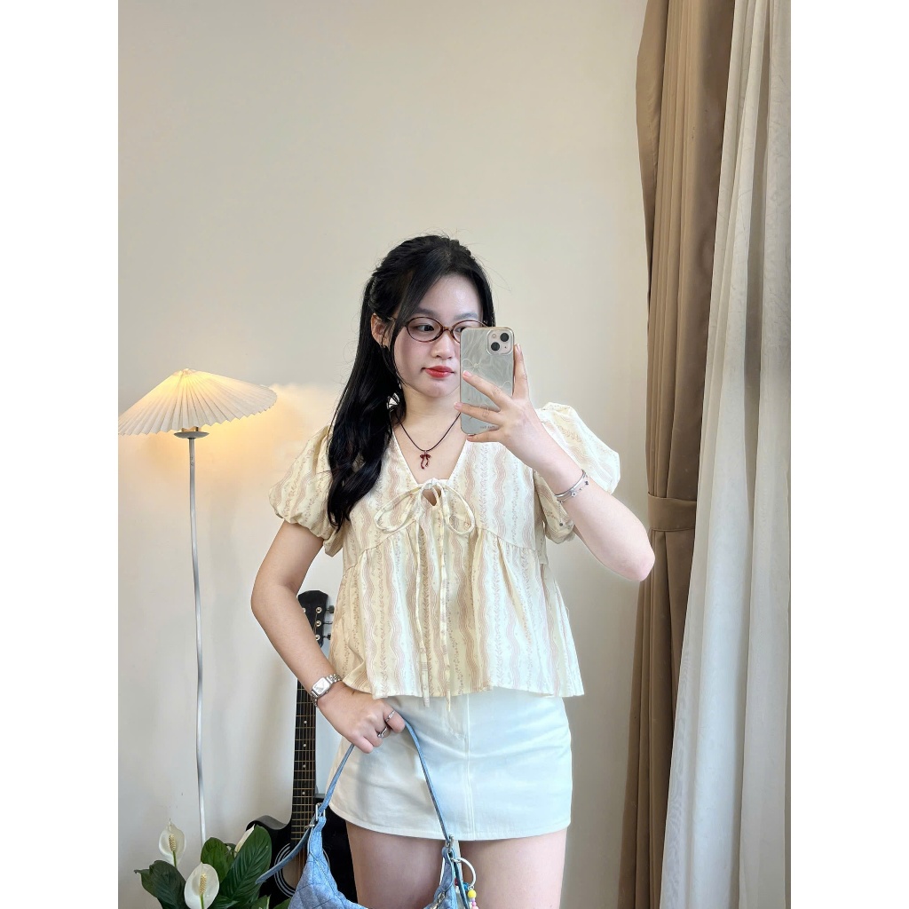 Áo sơ mi babydoll Joolate cổ V ngắn tay hoạ thiết hoa nhí thắt nơ Aobbd538 P0K34