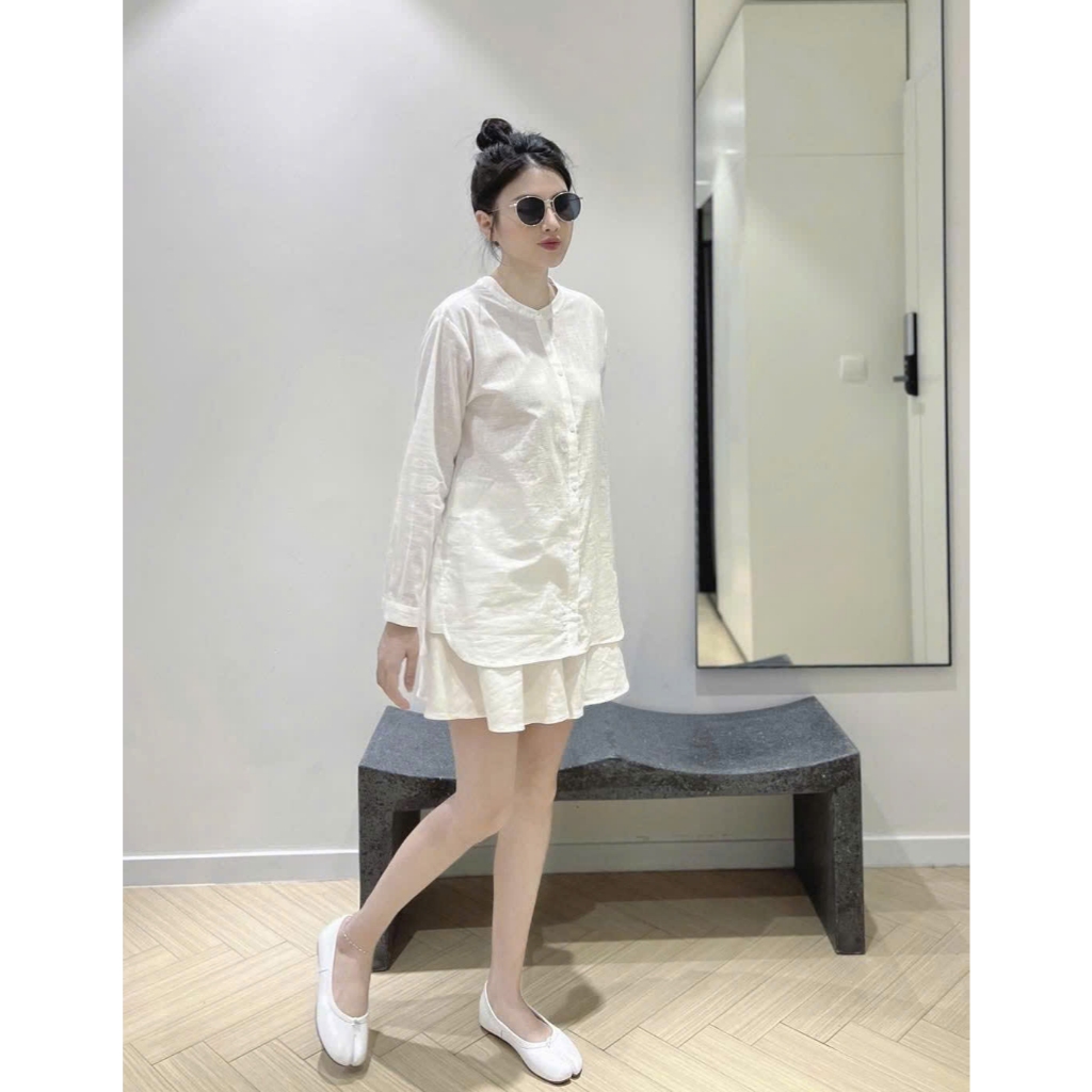 Set đồ nữ đẹp mặc đi biển, đi chơi, form dáng chuẩn gồm áo sơ mi cổ trụ mix chân váy xòe phồng.