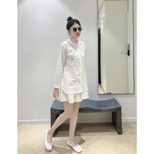 Set đồ nữ đẹp mặc đi biển, đi chơi, form dáng chuẩn gồm áo sơ mi cổ trụ mix chân váy xòe phồng.
