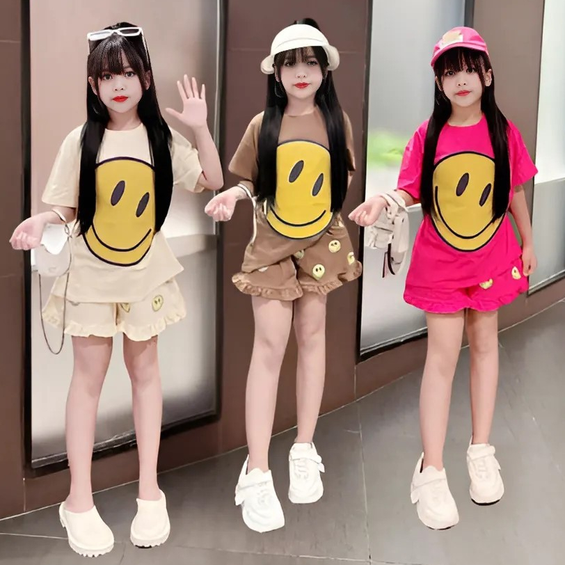 4-14 TUỔI Bộ quần áo bé gái áo cộc tay in hình mặt cười dễ thương chất vải cotton mềm mịn.M19