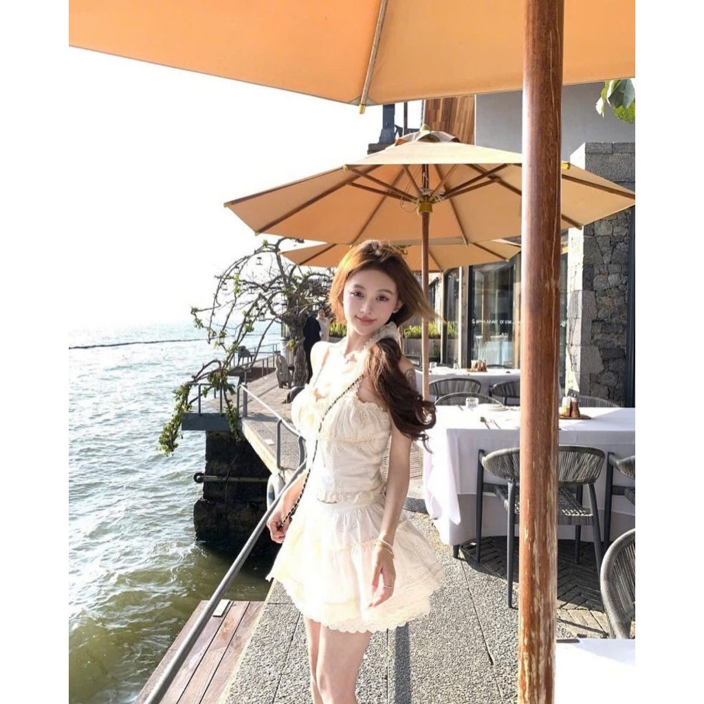 Set Váy Áo Corset Ren Trắng Cổ Yếm Cúp Ngực Kèm Chân Váy Ngắn Thô Boi Đi Biển SAN Clothings - P115