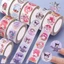 Cuộn 500 miếng sticker hoạt hình mini đường kính 2.5cm