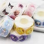 Cuộn 500 miếng sticker hoạt hình mini đường kính 2.5cm