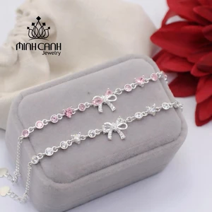 Lắc Tay Bạc Nữ Nơ Đá Mix Trái Tim - Minh Canh Jewelry
