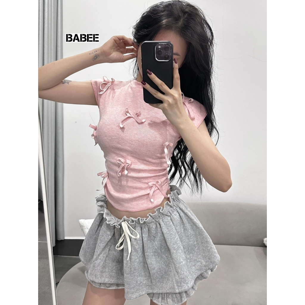 Áo Thun Nữ BABEE Cổ Tròn Ôm Tay Ngắn Vạt Bầu Chiết Eo Gắn Nơ Dễ Thương Xinh Xắn Phong Cách Hàn Quốc