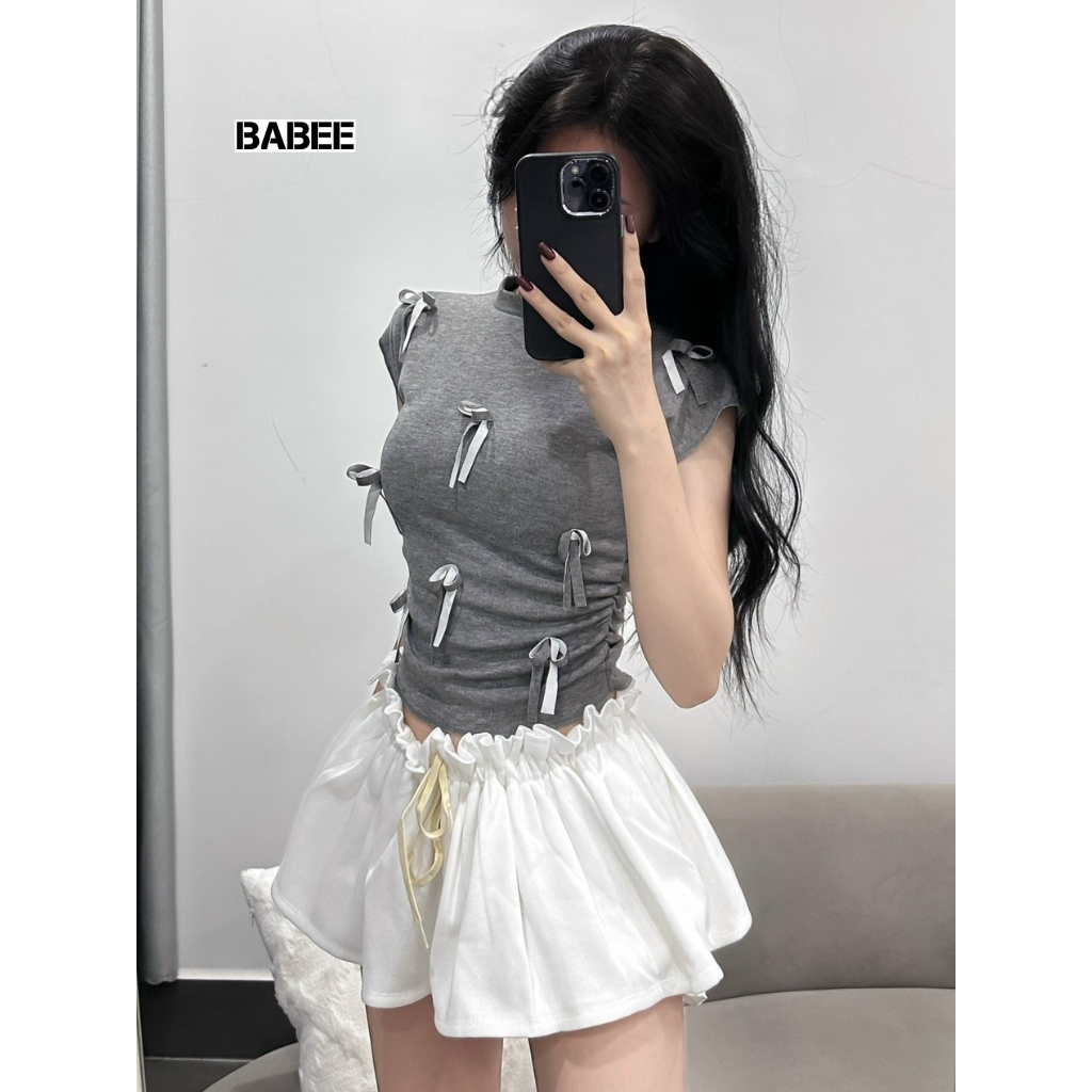 Áo Thun Nữ BABEE Cổ Tròn Ôm Tay Ngắn Vạt Bầu Chiết Eo Gắn Nơ Dễ Thương Xinh Xắn Phong Cách Hàn Quốc