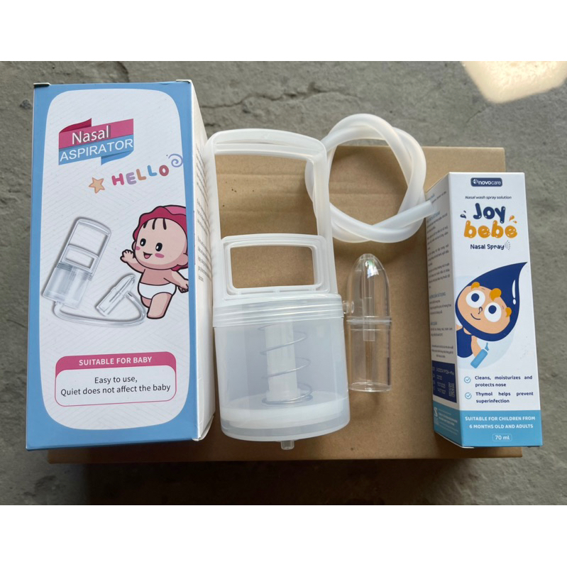 dụng cụ hút mũi cầm tay kèm dung dịch xịt rửa mũi