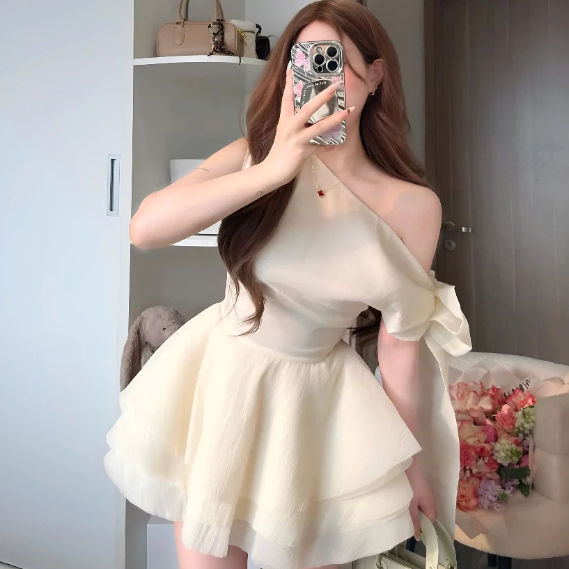Váy tiểu thư dự tiệc sang trọng lệch vai thắt nơ không tay dáng xòe bồng tầng Đầm đi ăn cưới bánh bèo nữ tính T1120G