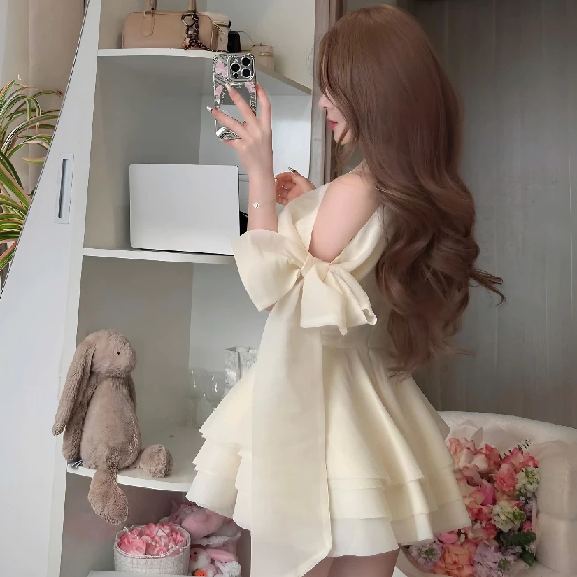 Váy tiểu thư dự tiệc sang trọng lệch vai thắt nơ không tay dáng xòe bồng tầng Đầm đi ăn cưới bánh bèo nữ tính T1120G
