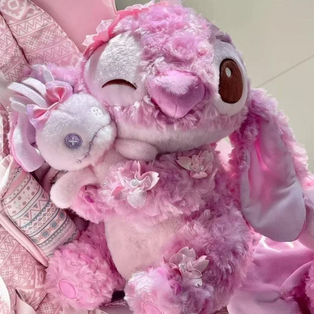 [ MẪU MỚI ] Gấu bông stitch sakura ôm thỏ dễ thương, Thú nhồi bồng stitch hồng gắn cánh hoa cao cấp làm quà tặng