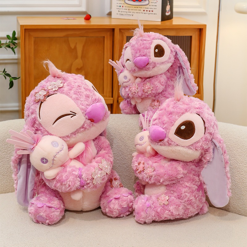 [ MẪU MỚI ] Gấu bông stitch sakura ôm thỏ dễ thương, Thú nhồi bồng stitch hồng gắn cánh hoa cao cấp làm quà tặng