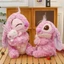 Gấu bông stitch sakura ôm thỏ lông xù cao cấp, Stitch hồng hoa anh đào mẫu mới dễ thương