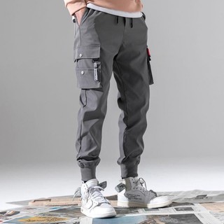 Quần dài jogger phối túi hộp kèm dây tag vàng chất kaki dày dặn ống bo đứng form kiểu dáng hiphop năng động K1