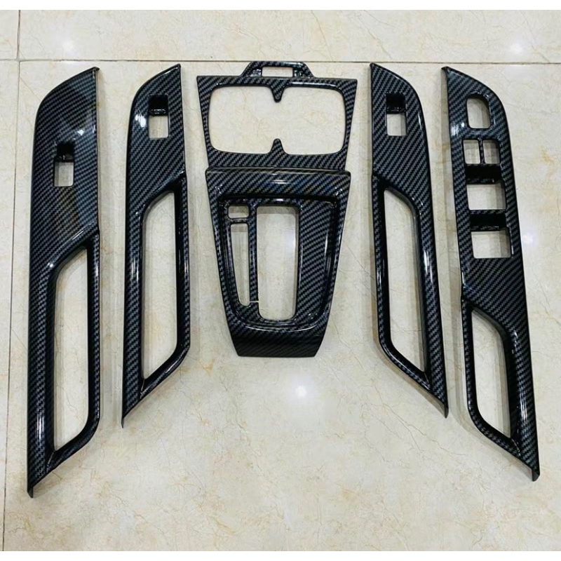 Ốp nội thất xe XL7, Ertiga bản số tự động nhựa ABS vân Carbon hàng cao cấp