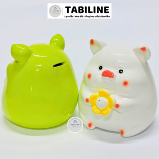 Heo đất ống tiết kiệm tiền lỗ ngang heo ôm hoa xinh xắn đáng yêu LD43 - TABILINE