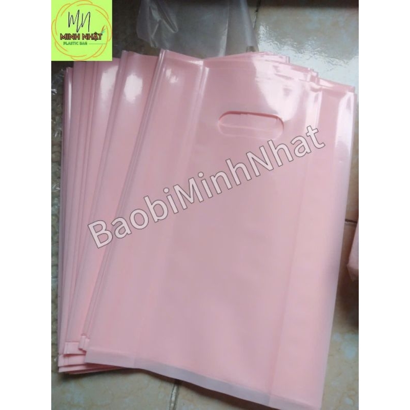 Túi nilong đựng hàng hột xoài có quai xách PE dẻo bóng loại 1 màu hồng đào, hồng pastel