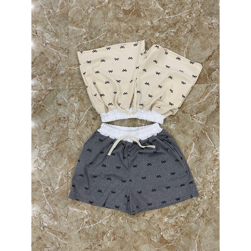 Quần đùi nữ in hình nơ cạp chun có túi 35-55 kg | BigBuy360 - bigbuy360.vn