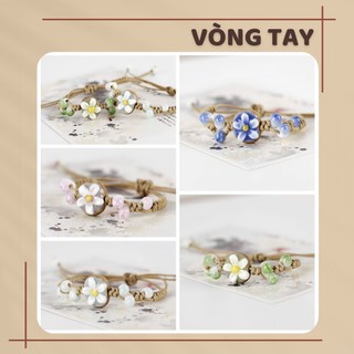 Vòng Tay Thủ Công Hoa Sứ Trắng – Đá Ngọc Xanh Phối Dây Thừng Vintage Nữ Tính