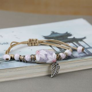 Vòng Tay Thủ Công Hoa Sứ Trắng – Đá Ngọc Xanh Phối Dây Thừng Vintage Nữ Tính