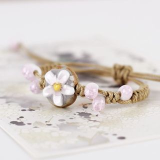Vòng Tay Thủ Công Hoa Sứ Trắng – Đá Ngọc Xanh Phối Dây Thừng Vintage Nữ Tính