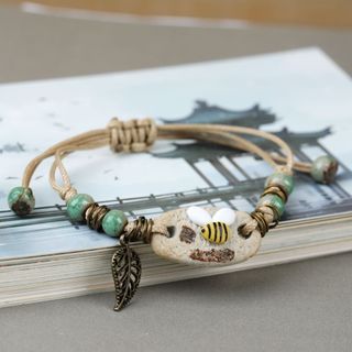 Vòng Tay Thủ Công Hoa Sứ Trắng – Đá Ngọc Xanh Phối Dây Thừng Vintage Nữ Tính