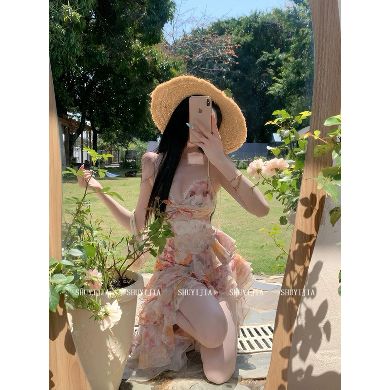 Đầm lụa hoa hai dây khoét chân ngực tà lai dài.Đầm đi biển,đi du lịch đi dự tiệc.