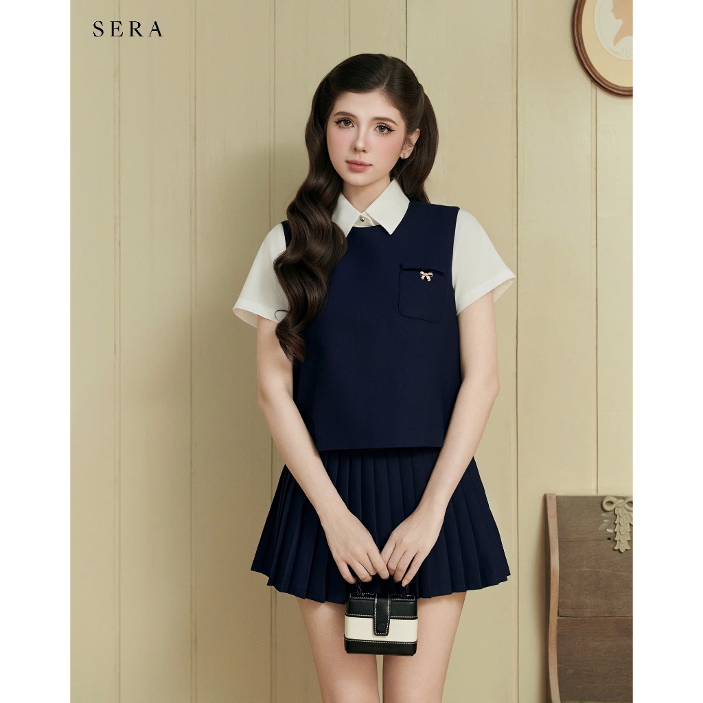 SERA - Set áo gile và chân váy xếp ly đính nơ Jolie