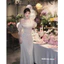 Váy đầm thiết kế lụa trễ vai thắt nơ dáng dài màu be chất lụa mềm sang chảnh phong cách Tiểu thư New 2025