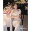 Váy đầm thiết kế lụa trễ vai thắt nơ dáng dài màu be chất lụa mềm sang chảnh phong cách Tiểu thư New 2025