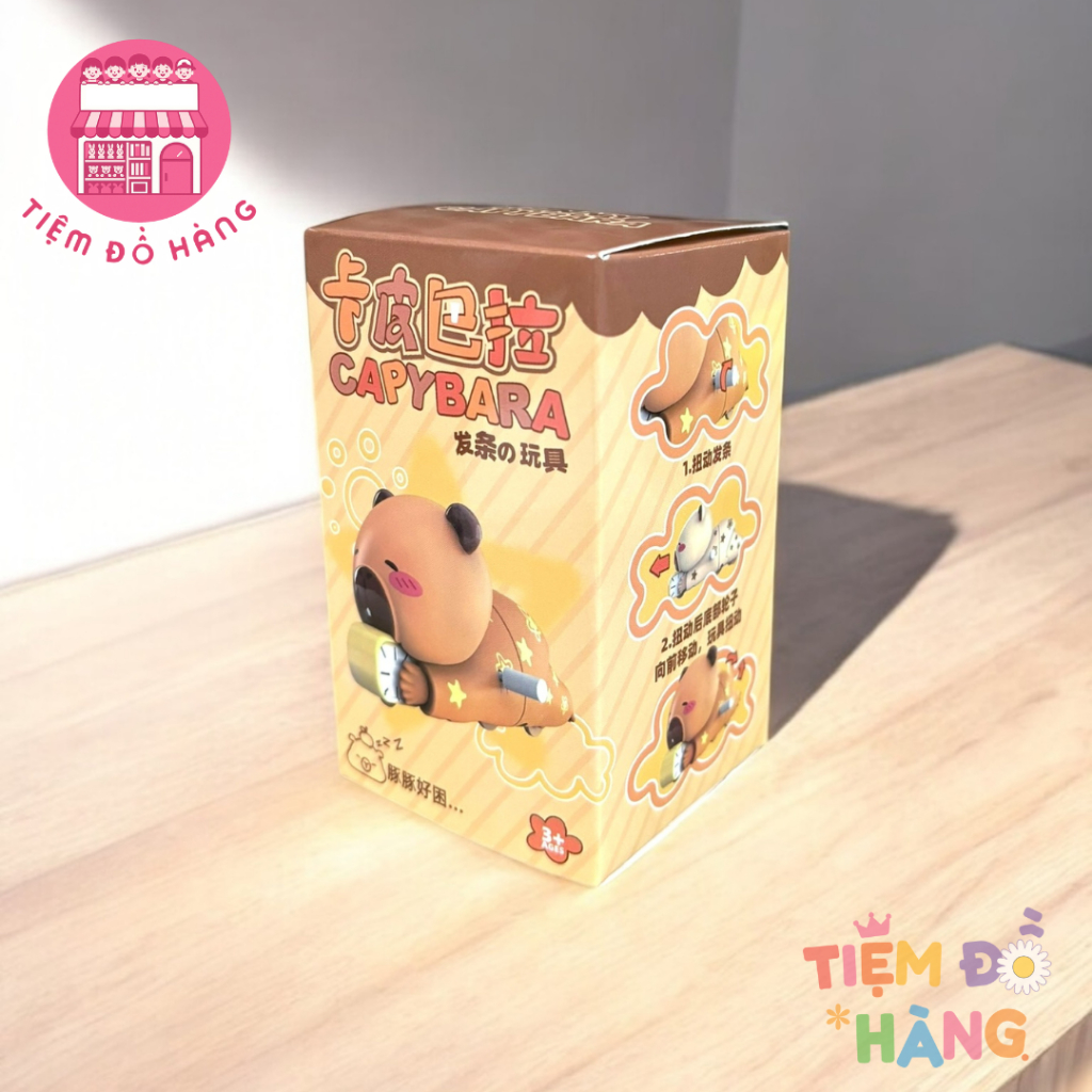Đồ Chơi Capybara Vặn Cót Ôm Đồng Hồ Ngủ Nướng Tự Động Di Chuyển