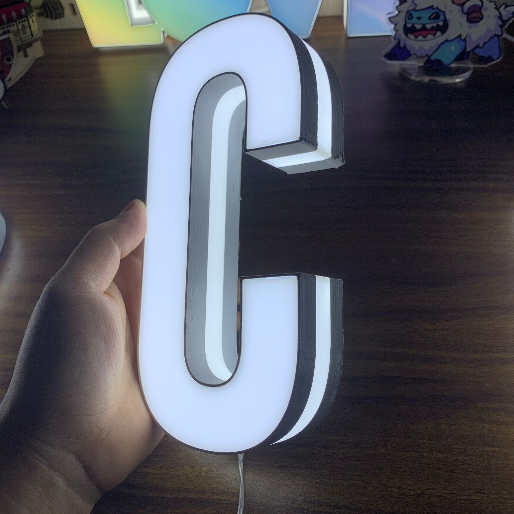 Chữ nổi mica sáng đèn, chữ cao 20cm dùng trang trí biển quảng cáo, mặt và cạnh đều phát sáng.Chữ Dán Tường