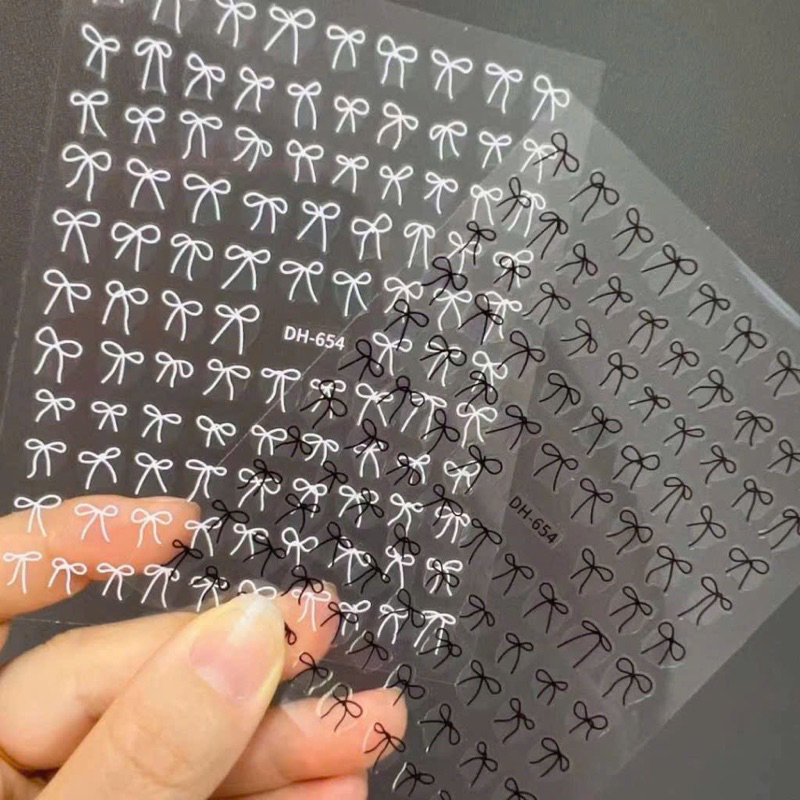 Sticker nơ màu trắng mã DH 654 và DH 592 mới, hình dán móng stick (còn ...