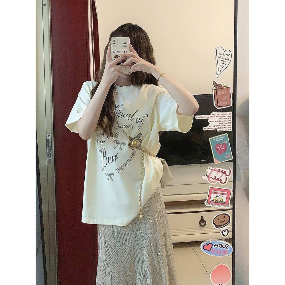 Áo thun nữ ngắn tay in hình Nơ Visual JULY FASHION, Áo thun ngắn tay nữ dáng rộng in hình Chất Cotton 4 chiều mềm đẹp