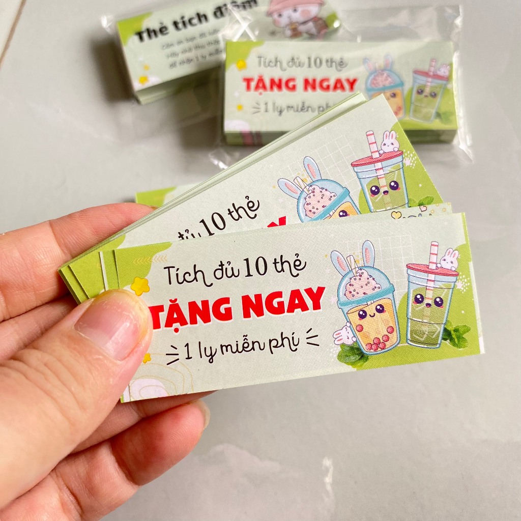 100 thẻ tích điểm kt 30x80mm, tích được 10 thẻ tặng 1 ly miễn phí -giấy c100 mỏng lắm ạ