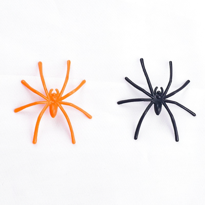 Nhện nhựa màu đen màu cam trang trí halloween gắn trên tơ nhện , mạng nhện