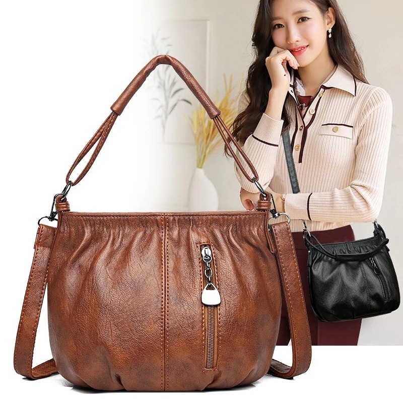 Túi xách nữ da mềm dáng bầu Quảng châu kích thước 22x18x12cm BAU145 Mun Store 94