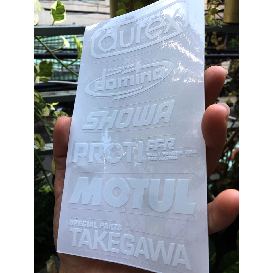 Tờ DUREXDOMINO chữ trắng in UV nền trong suốt. Decal chống nước. Logo Sticker cao cấp