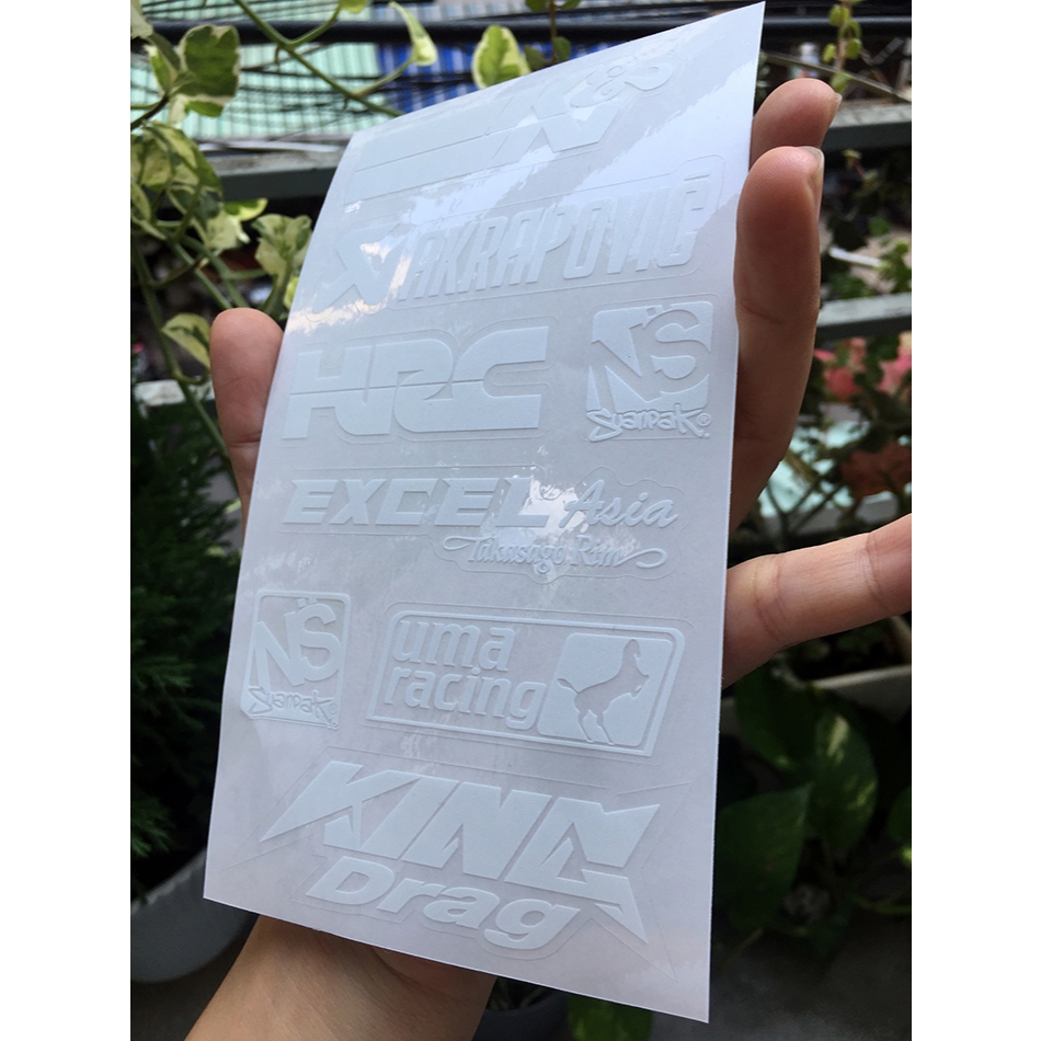 Tờ KN-AKRAPOVIC chữ trắng in UV nền trong suốt. Decal chống nước. Logo Sticker cao cấp
