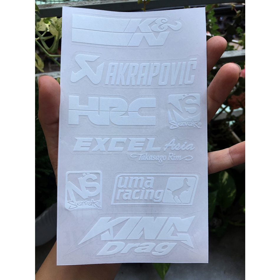 Tờ KN-AKRAPOVIC chữ trắng in UV nền trong suốt. Decal chống nước. Logo Sticker cao cấp