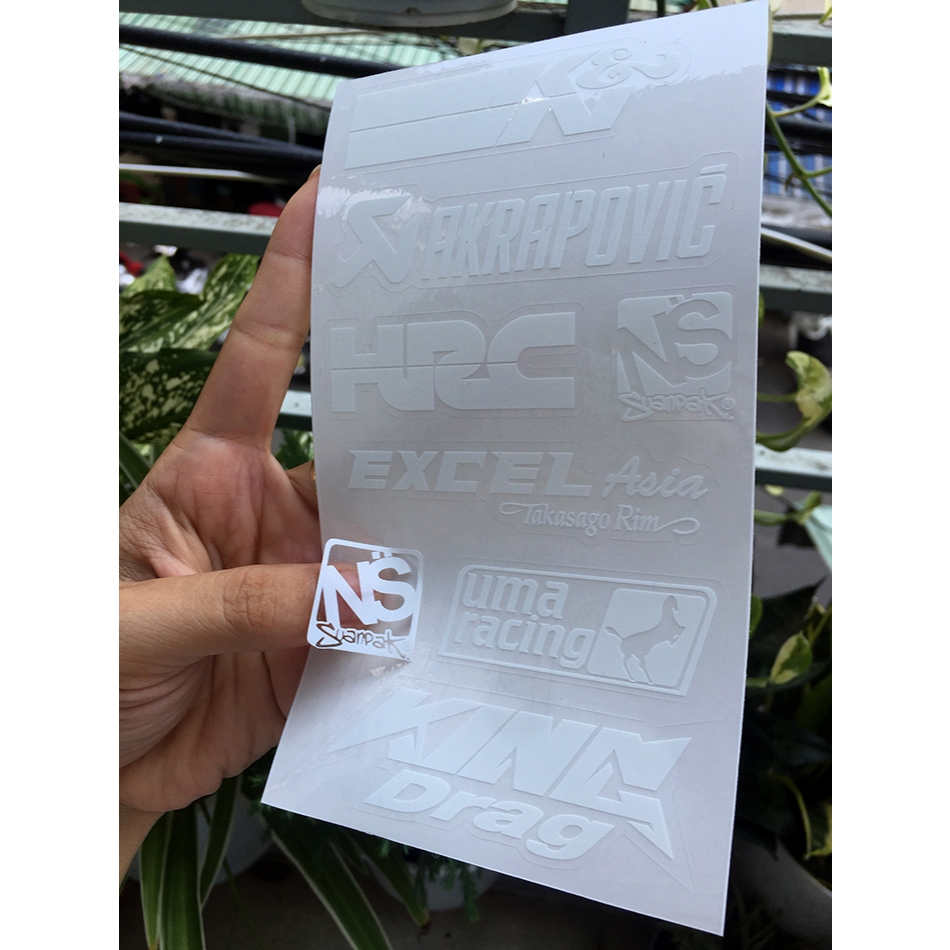 Tờ KN-AKRAPOVIC chữ trắng in UV nền trong suốt. Decal chống nước. Logo Sticker cao cấp