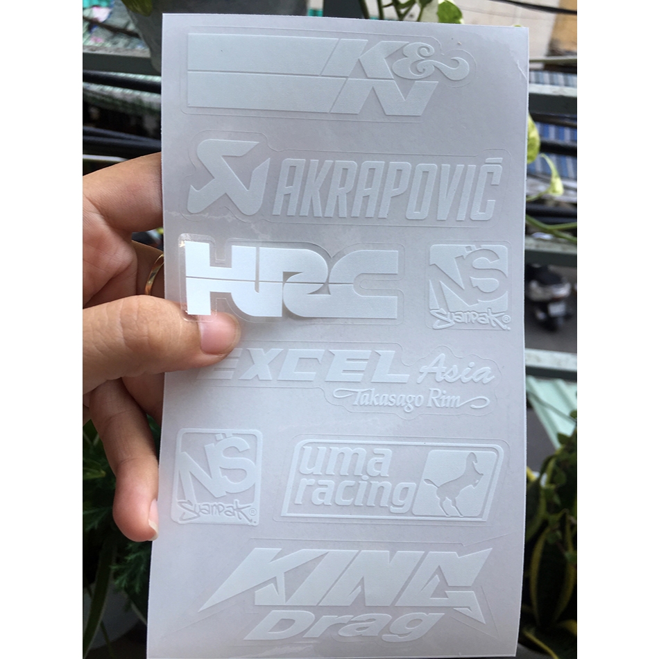Tờ KN-AKRAPOVIC chữ trắng in UV nền trong suốt. Decal chống nước. Logo Sticker cao cấp