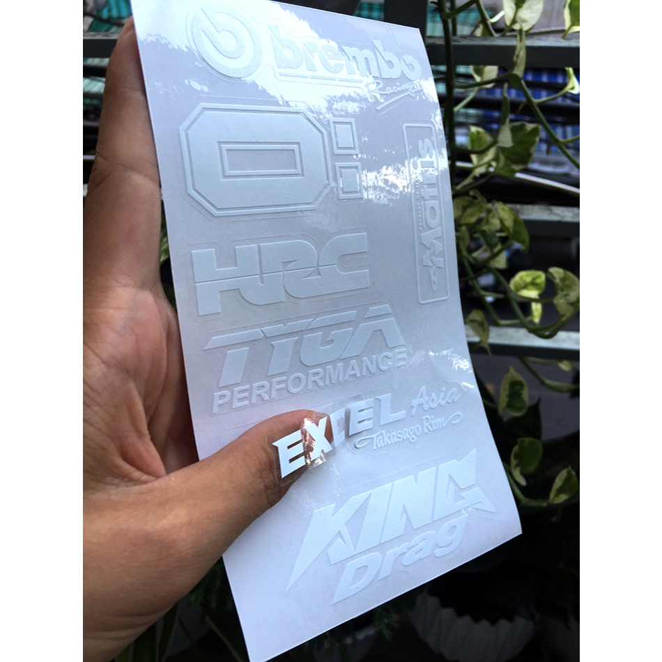 Tờ BREMBO OLIN MATRIS chữ trắng in UV nền trong suốt. Decal chống nước. Logo Sticker cao cấp