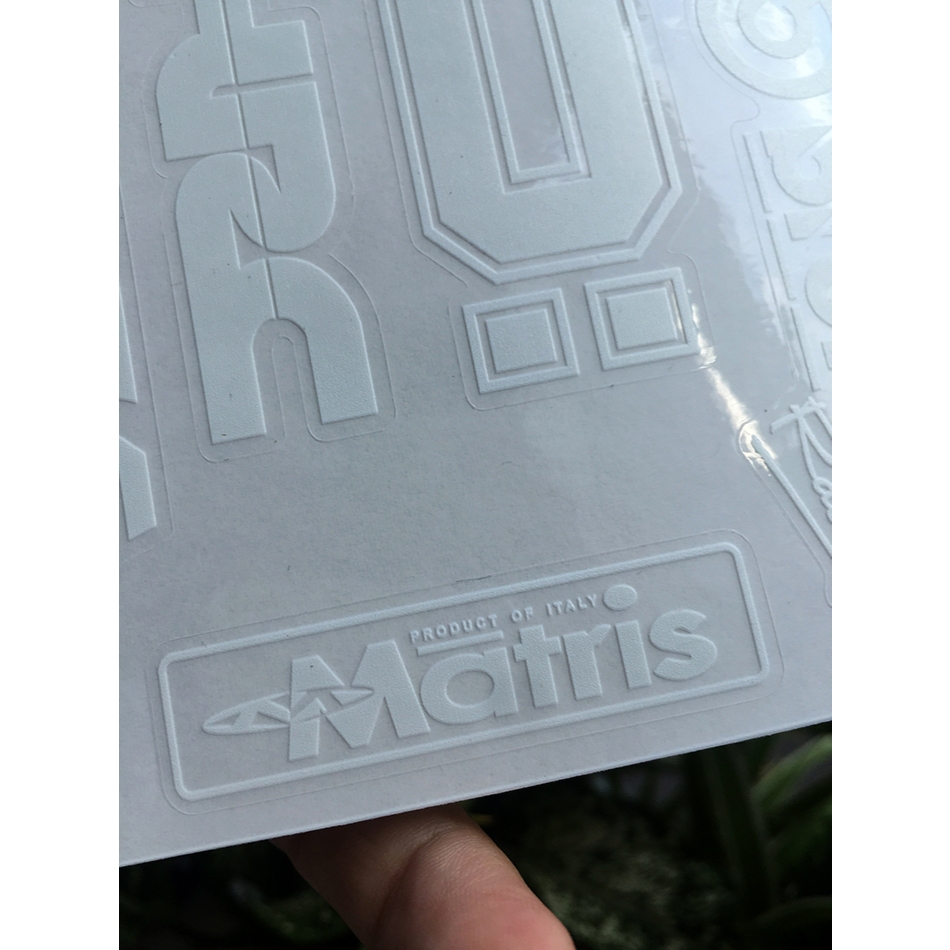 Tờ BREMBO OLIN MATRIS chữ trắng in UV nền trong suốt. Decal chống nước. Logo Sticker cao cấp