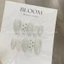 Nailbox thiết kế trắng thạch mix ngôi sao bạc form oval basic Bloom.nailbox