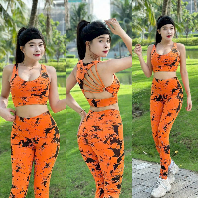 Bộ tập thể thao phối màu loang . Chất liệu thun poly hai da , co giãn , thoáng khí