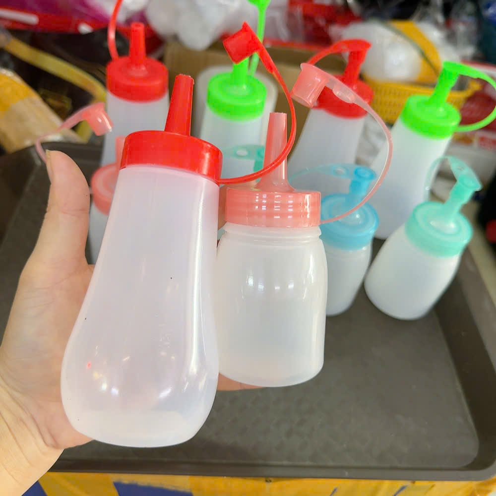 Chai, lọ, bình có vòi nút đậy bằng nhựa dung tích(150ml, 250ml) có đủ màu dùng để đựng sốt- Chai nhựa đựng sốt.
